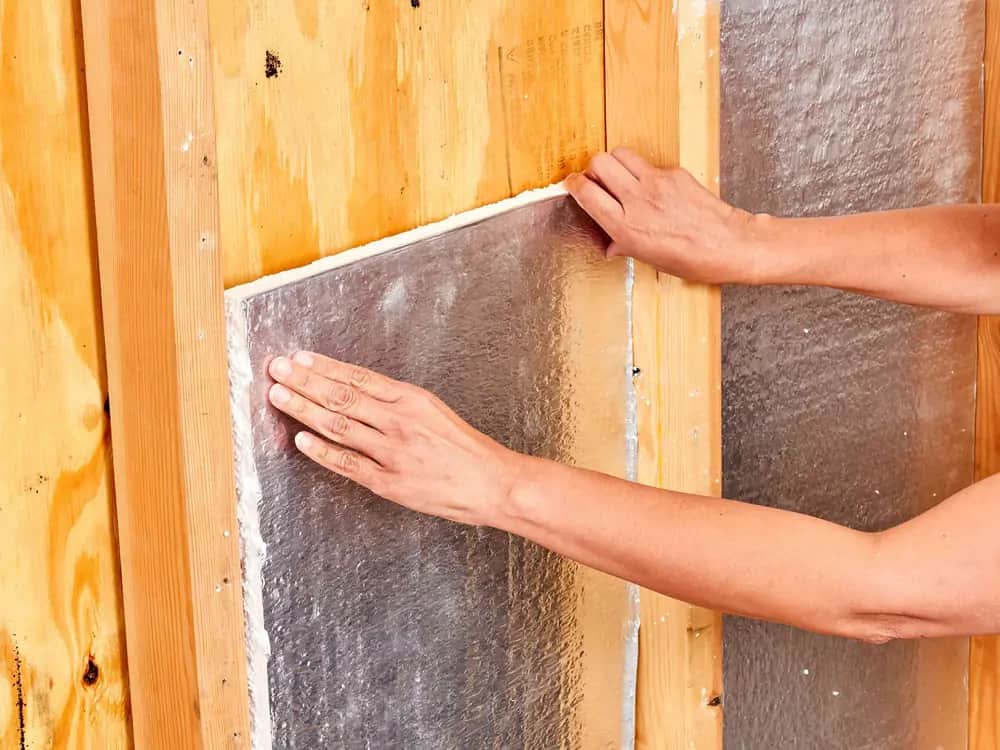 Rigid foam board panels installed across an interior wall