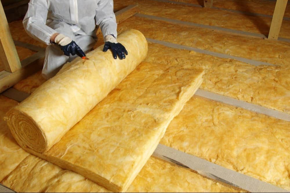 Finished attic insulation showing clean, complete coverage