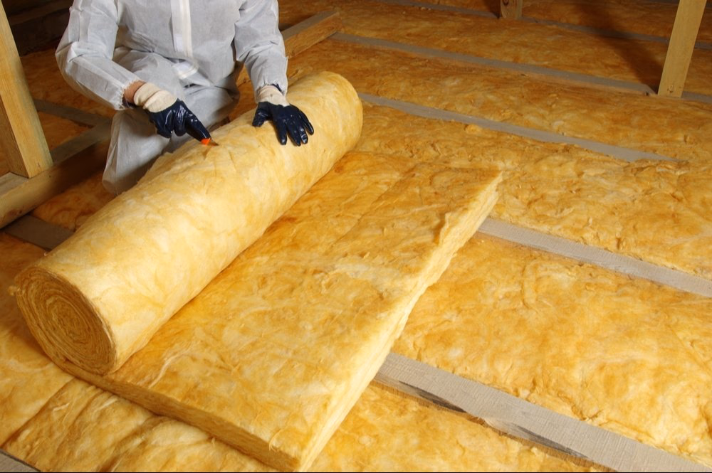 Finished attic insulation showing clean, complete coverage