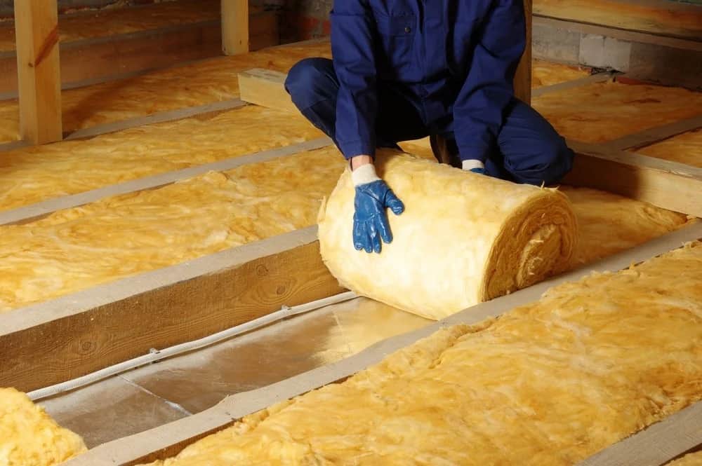 VR Insulation crew sealing and applying insulation on a job site