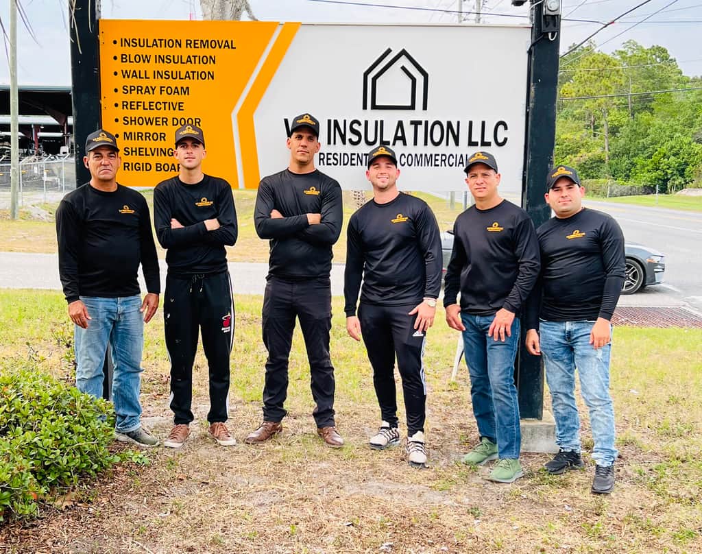 The VR Insulation crew with the company vehicles